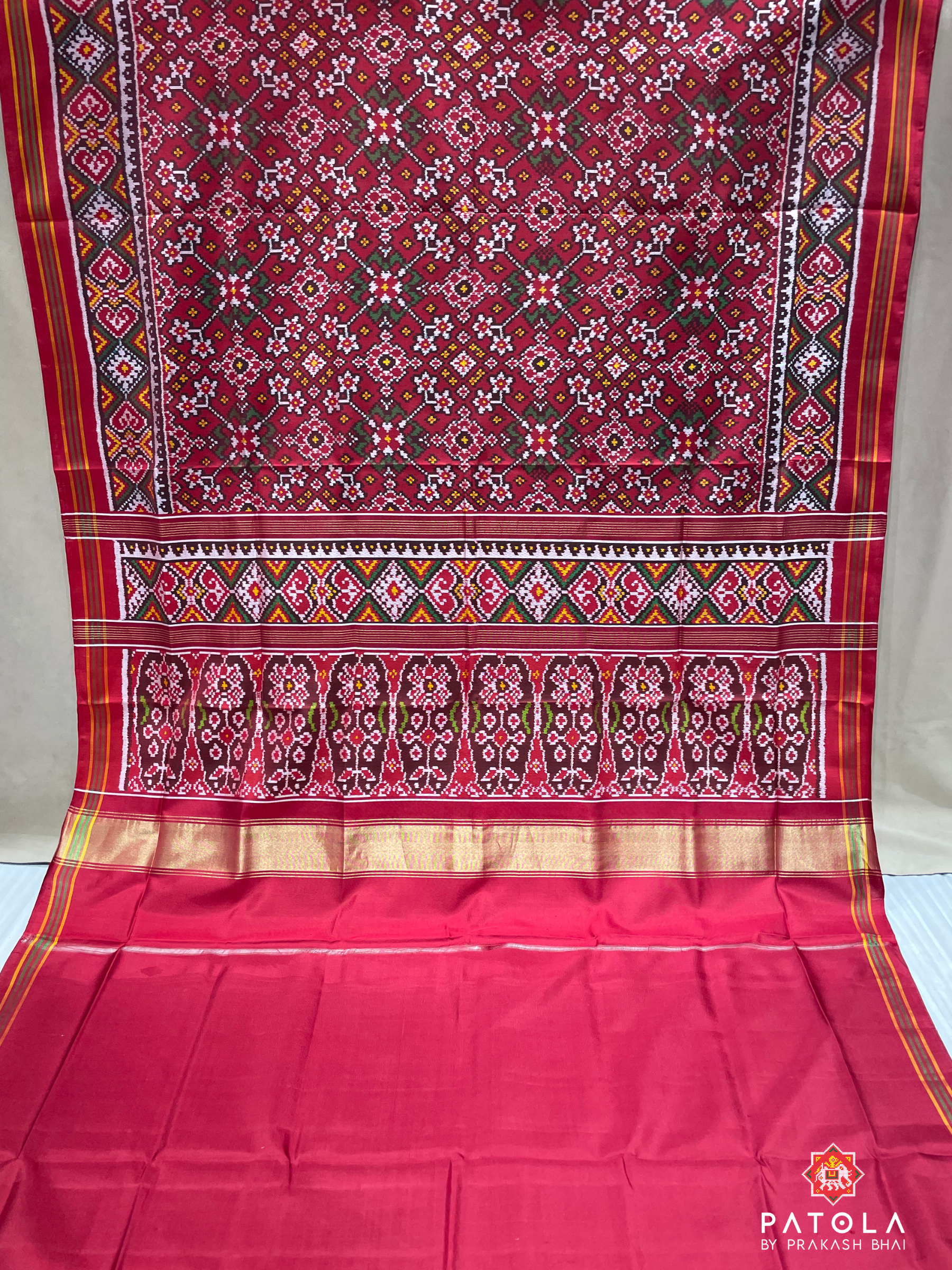 Navratna Design With Selaari Border Semi Double Ikat Patola Saree